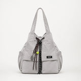Carryall – Convertible Drawstring Canvas Tote Backpack with Cargo Pockets