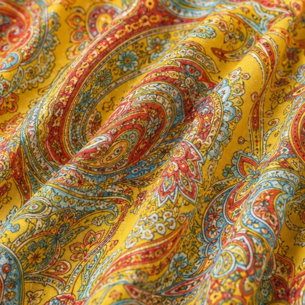 Solivia – Boho paisley halter maxi dress with open back and handkerchief hem