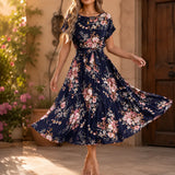 Florenza – Floral Pleated Midi Dress with Tie Waist and Flutter Sleeves