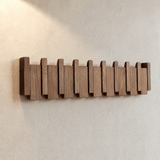 Pianello – Contoured Wood Wall Hanger with Fold-Down Hooks
