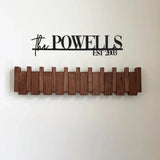 Pianello – Contoured Wood Wall Hanger with Fold-Down Hooks
